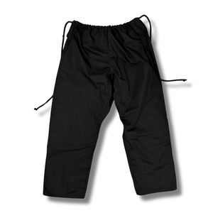 Rear view of black Adamantium BJJ ripstop pants with durable stitching and drawstring.